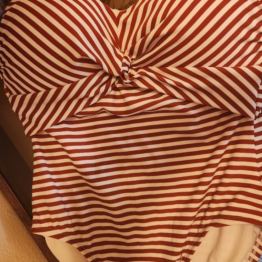 Red and white swimsuit.